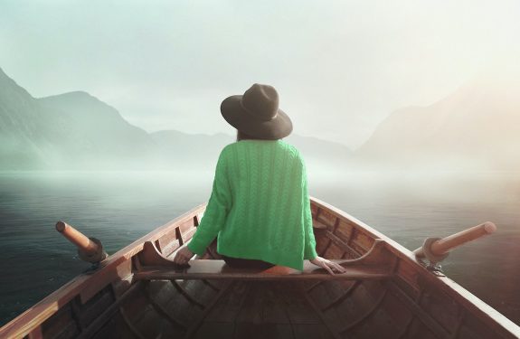 woman sitting on boat